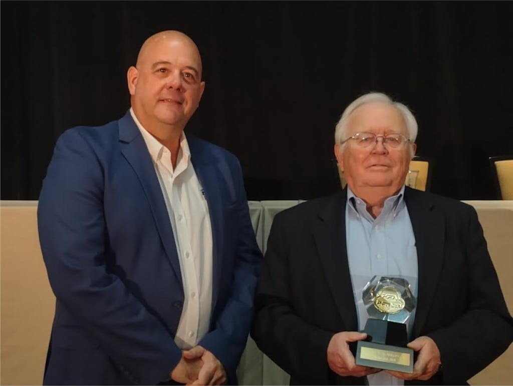 2021 Flexible Polyurethane Foam Hall of Fame Inductees, James T. McIntyre (r.), with PFA President Chip Holton of NCFI Polyurethanes. (Source: Everchem)